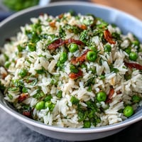 Spring Pea and Mint Rice Pilaf with vibrant green peas and fresh mint, a fragrant and colorful side dish perfect for spring meals.