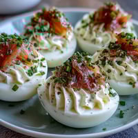 Creamy deviled eggs with smoked salmon and everything bagel seasoning—perfect brunch appetizer